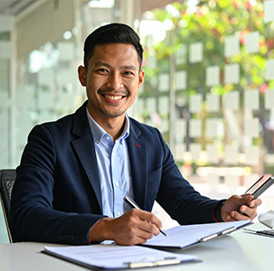 Couple reviewing investment documents